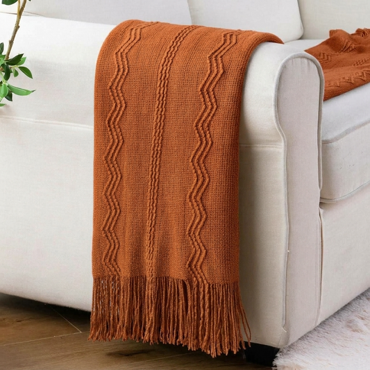 Comment mettre un plaid sur un canapé ? 7 idées pour un salon cosy et élégant